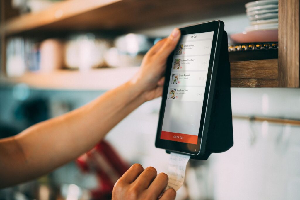 customer reviewing restaurant bill for hidden charges