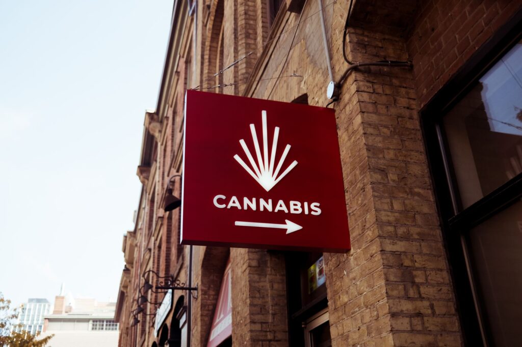 legal cannabis dispensary storefront in urban New Mexico contrast with rural county