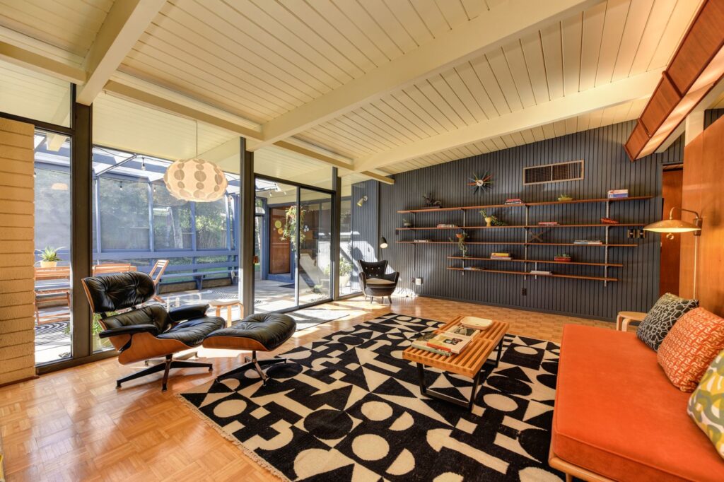 mid-century home interior showing why popcorn ceiling was popular with builders