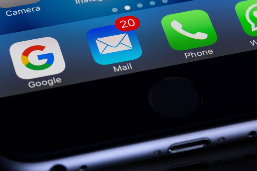user checking email inbox for a password reset link