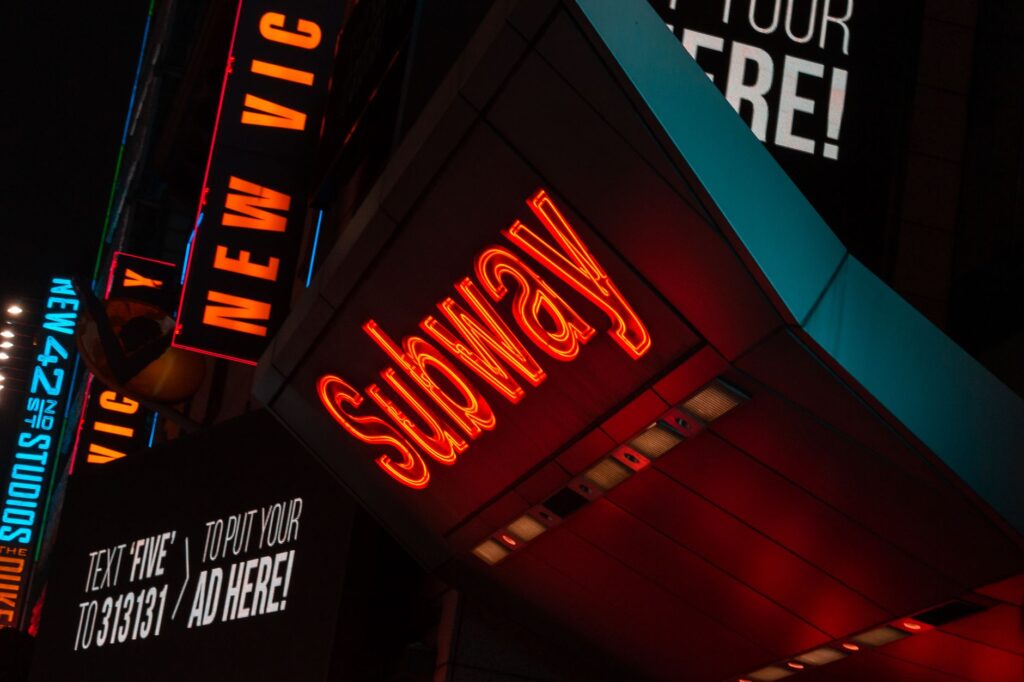 Times Square subway station entrance with commuters