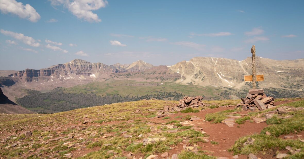 hiker standing at Kings Peak, Utah's highest point