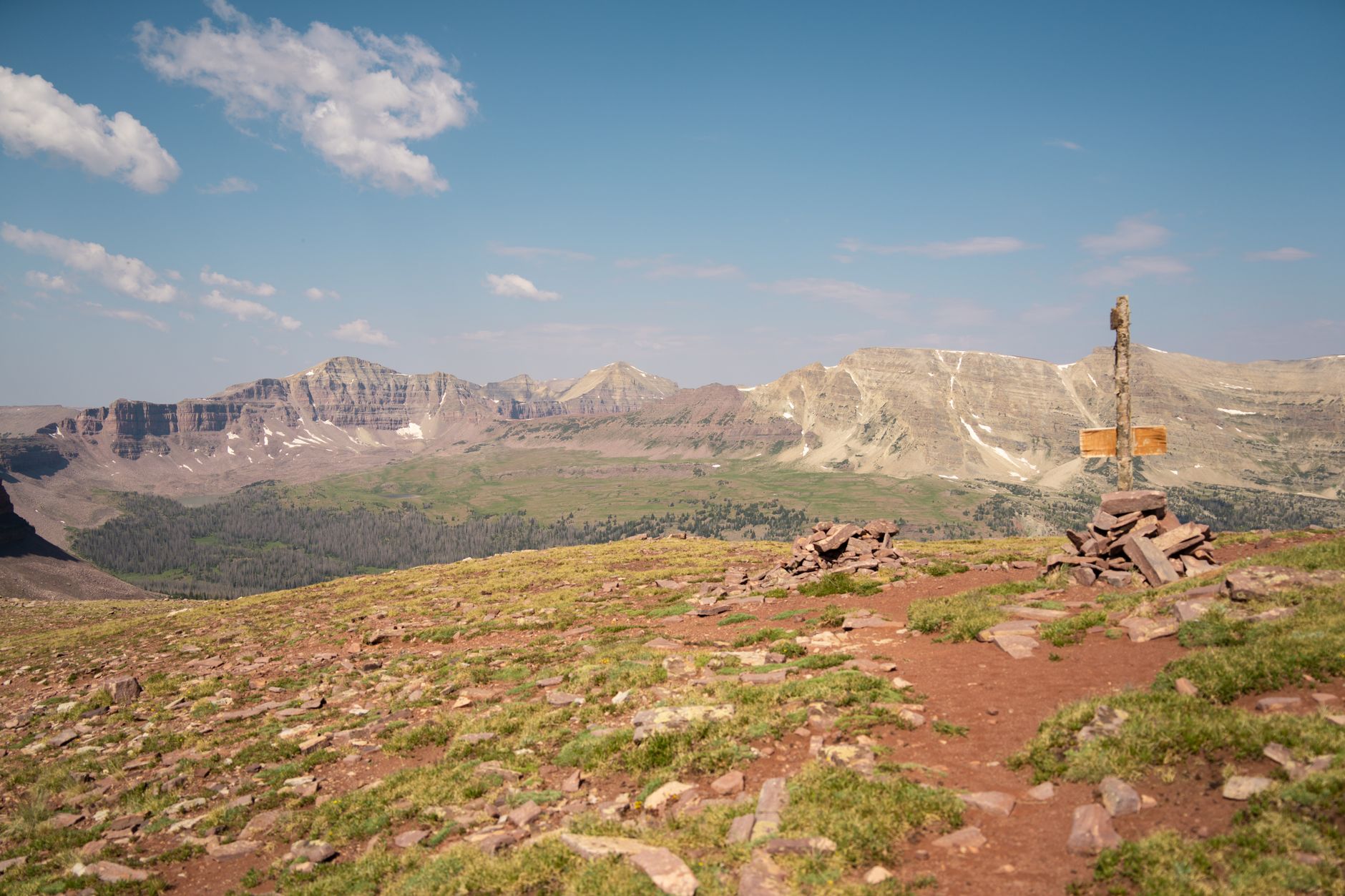 hiker standing at Kings Peak, Utah's highest point