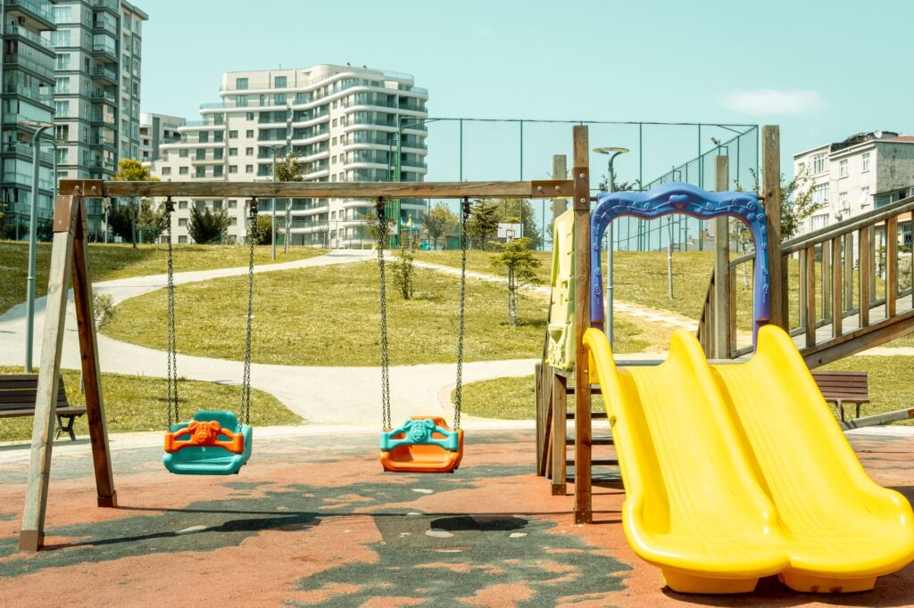families enjoying a park in one of Alabama's safest communities