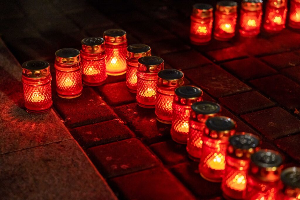 community members holding a vigil for a shooting victim in Brooklyn