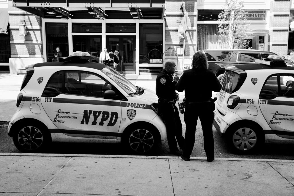 NYPD patrol car parked outside a Crown Heights Brooklyn apartment building