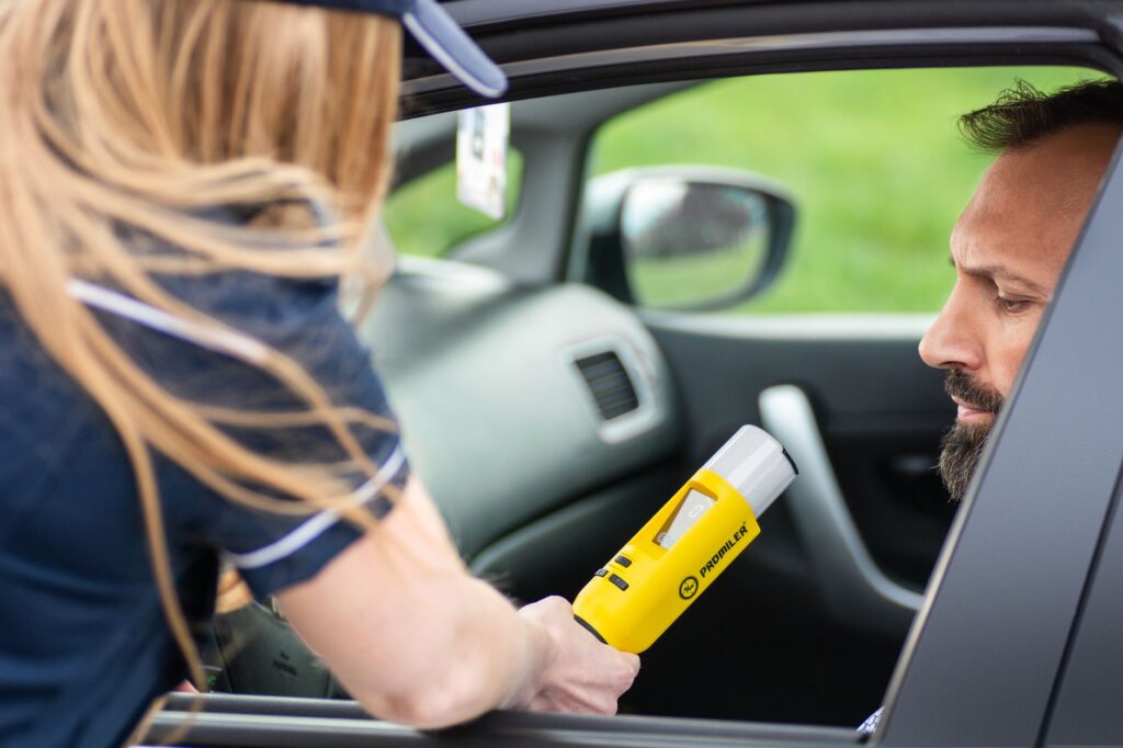 law enforcement conducting marijuana impaired driving roadside check in Colorado