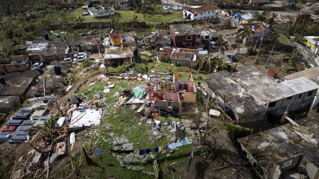 local residents working to rebuild in Acapulco after hurricane damage