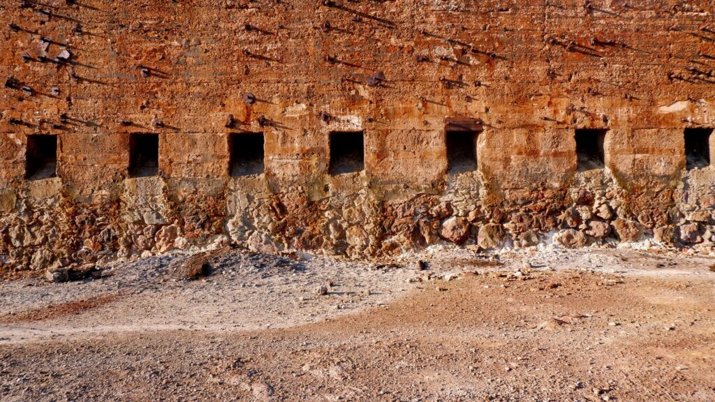 derelict buildings in a former Kansas mining town symbolizing economic decline and poverty