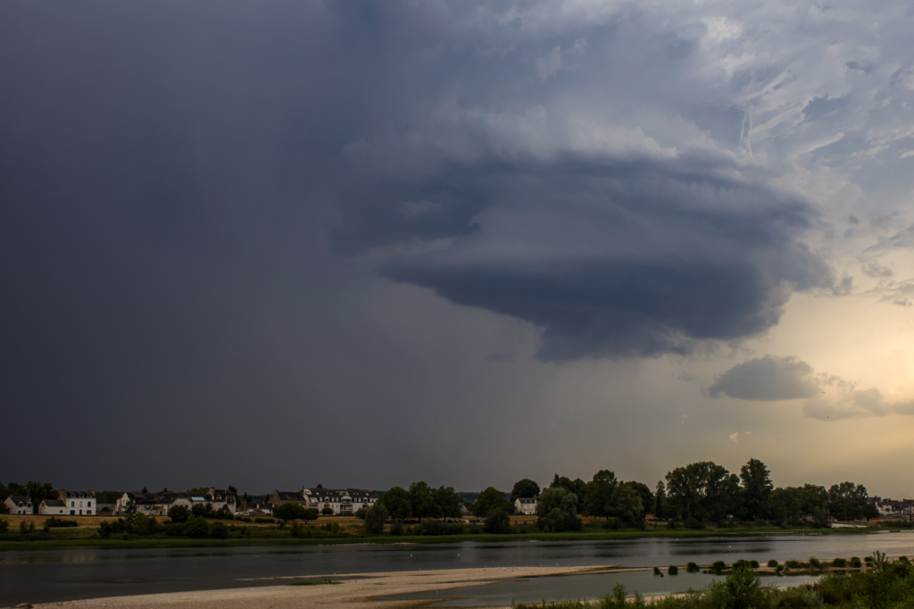 massive supercell storm producing hail and tornado warning conditions