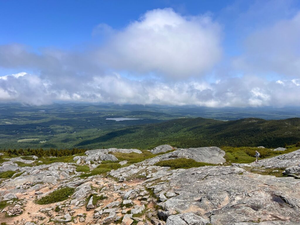 hikers at the summit of Mount Mansfield, Vermont's highest point