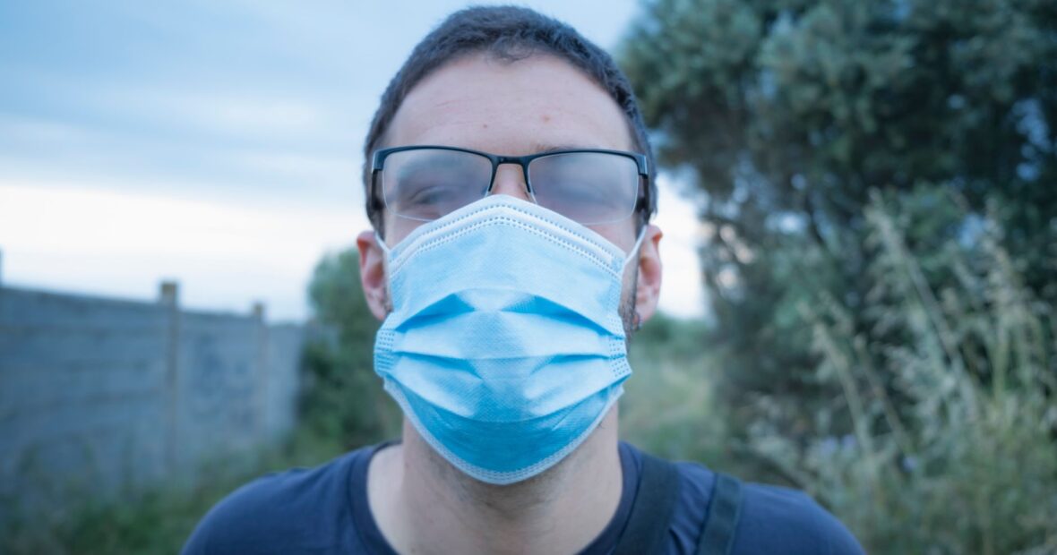 person wearing a covid face mask in a public setting