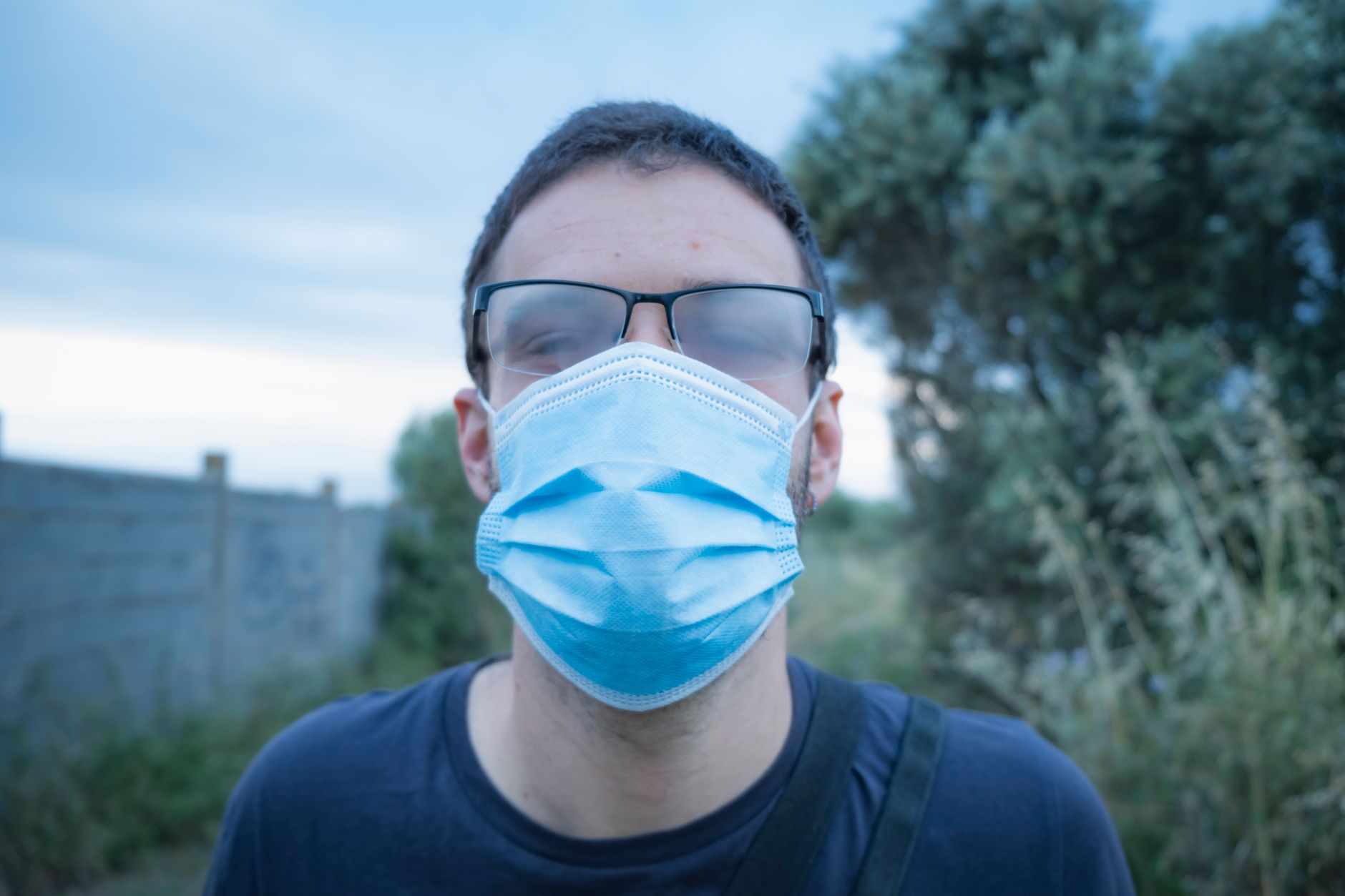 person wearing a covid face mask in a public setting
