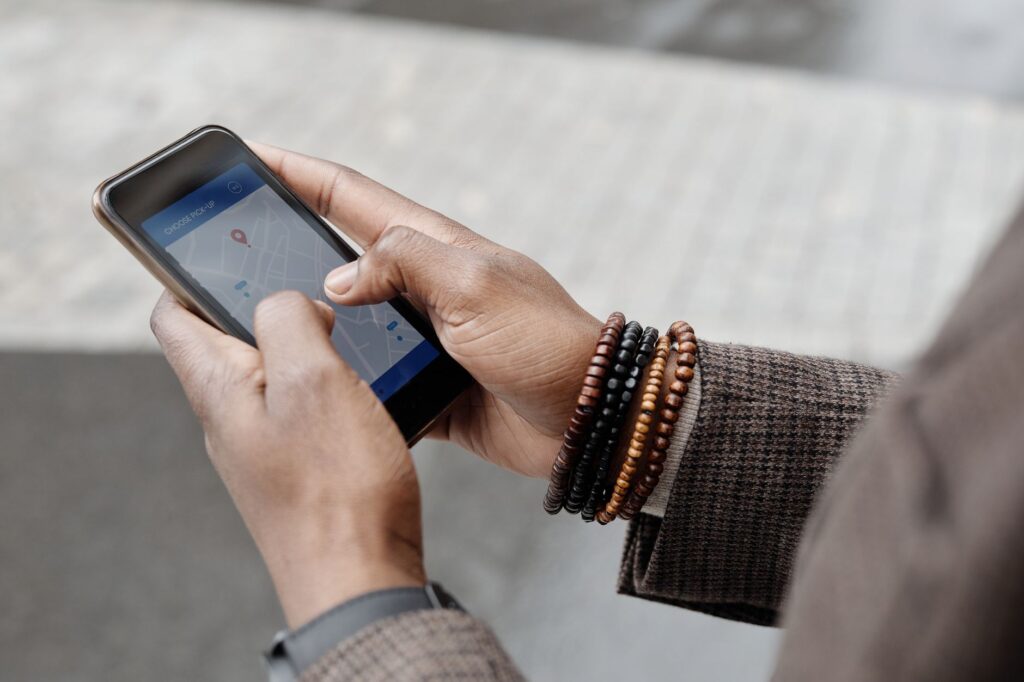 driver checking navigation app for real-time traffic advice