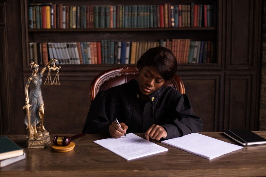 a courtroom setting representing the juvenile justice process following a DC robbery arrest