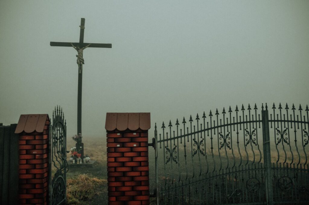iron gates of Resurrection Cemetery Chicago in fog