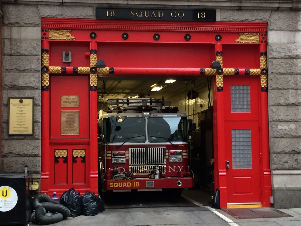 FDNY firefighters arriving at a Canarsie Brooklyn building fire scene