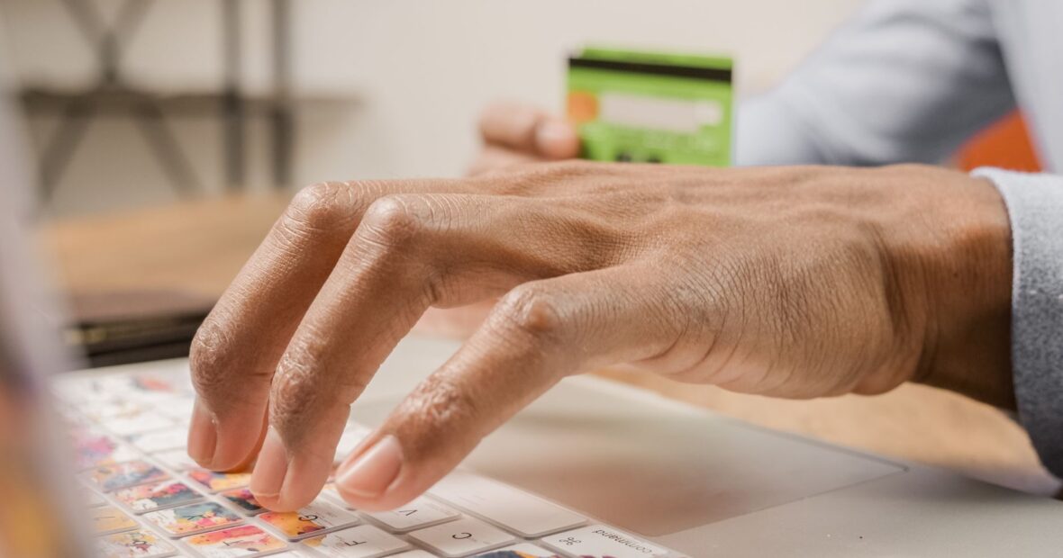 person securely resetting a password on a laptop