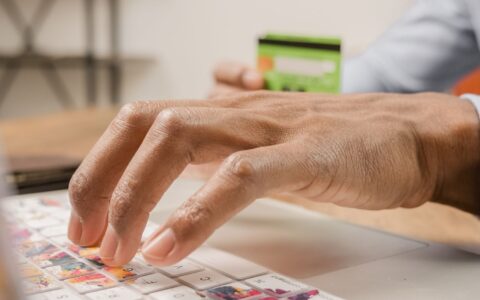 person securely resetting a password on a laptop