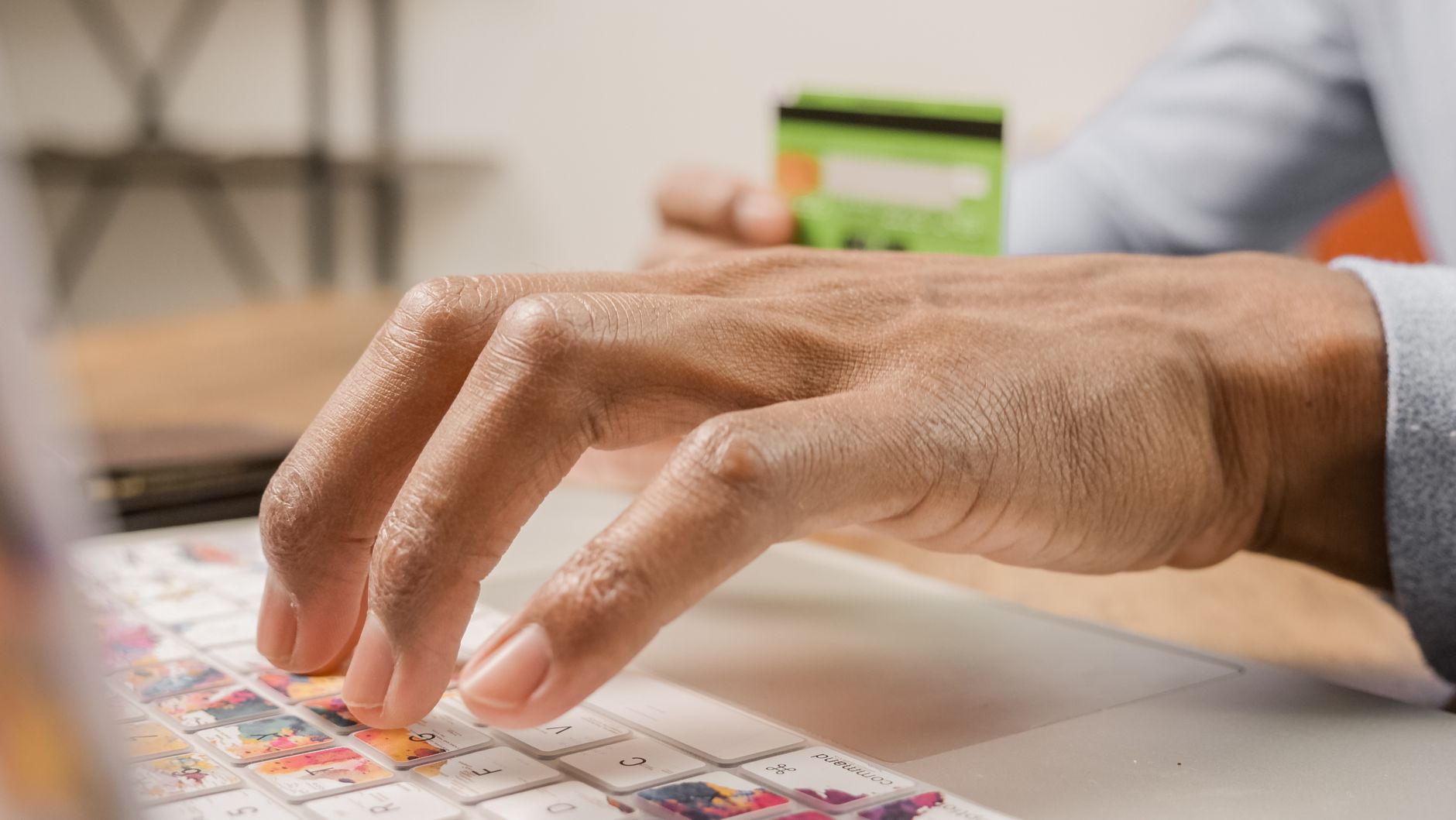 person securely resetting a password on a laptop