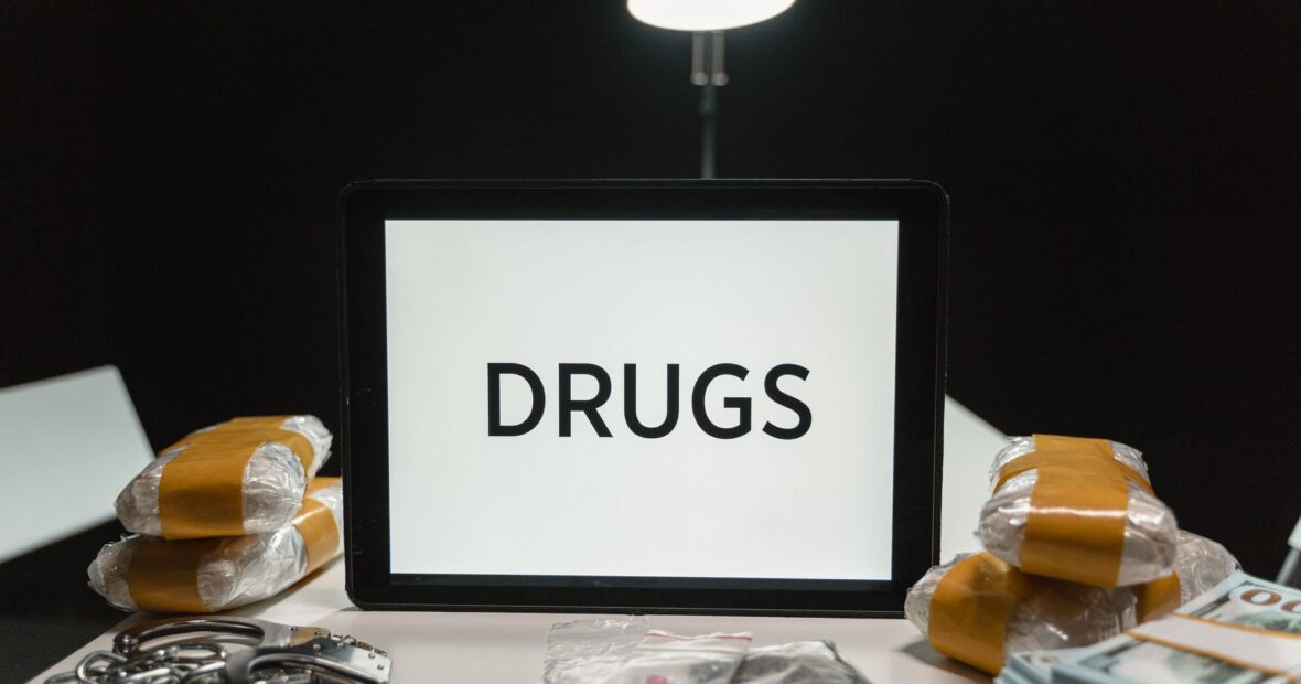 law enforcement officers conducting a hotel drug and weapon bust in Maryland
