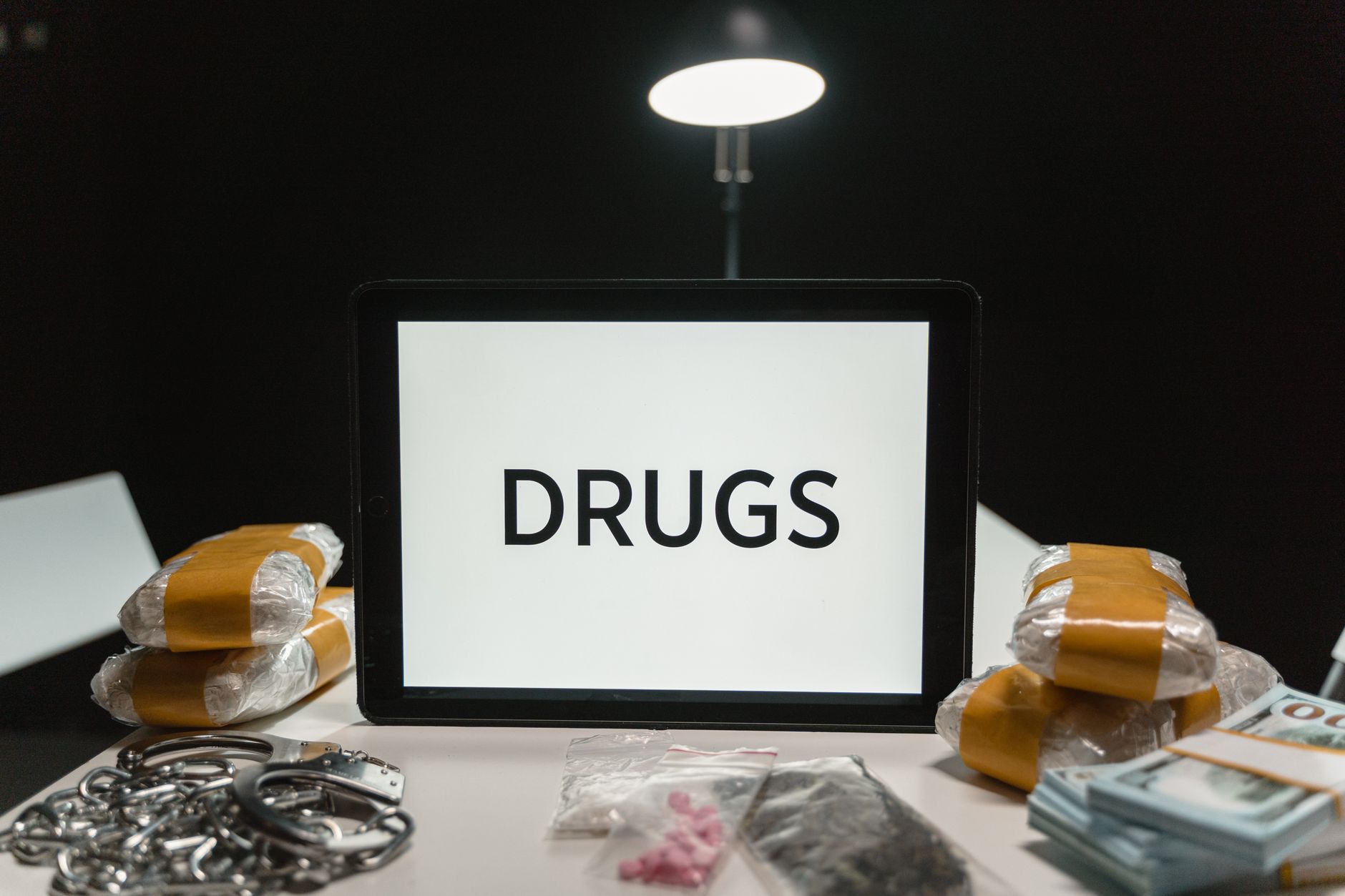 law enforcement officers conducting a hotel drug and weapon bust in Maryland