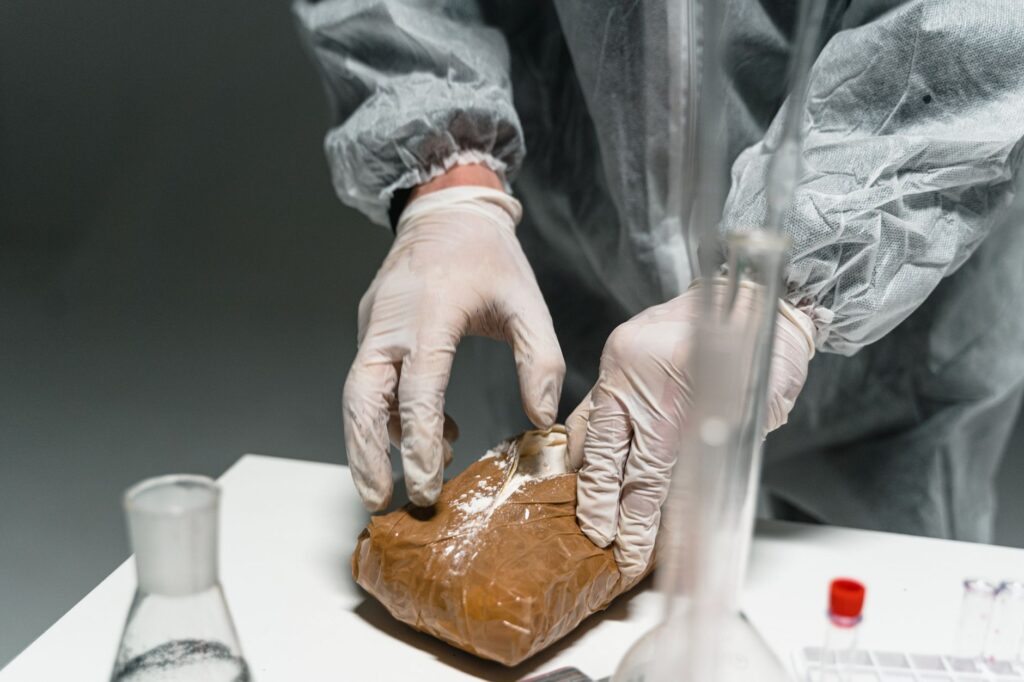 law enforcement displaying confiscated fentanyl evidence