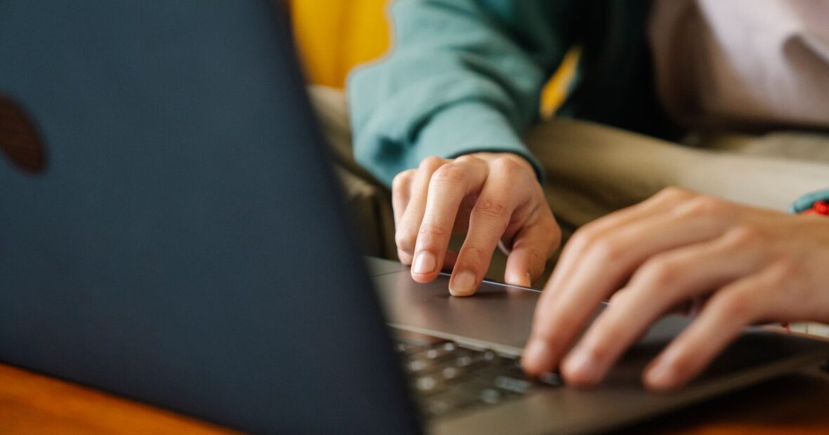 person using sign in page on laptop