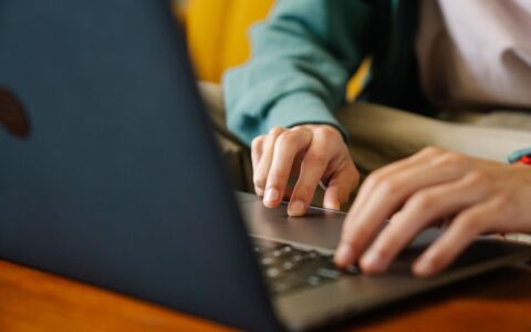 person using sign in page on laptop