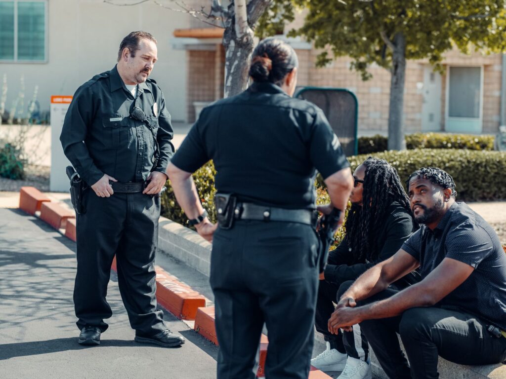 residents attending a community safety meeting following local gun violence