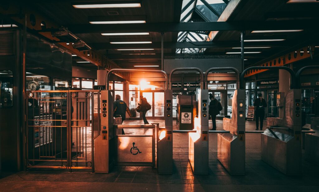 autonomous NYPD security robot patrolling a busy subway station
