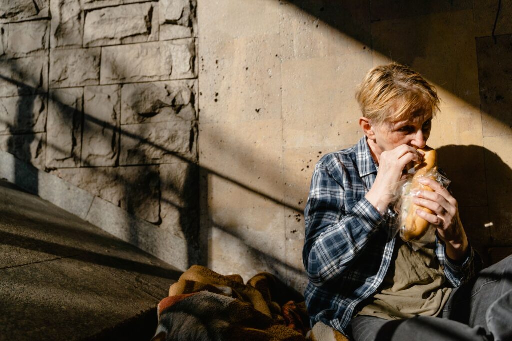 homeless youth on Texas street representing human trafficking vulnerability