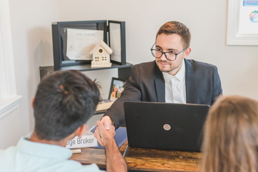 financial advisor discussing personal loan default options with client