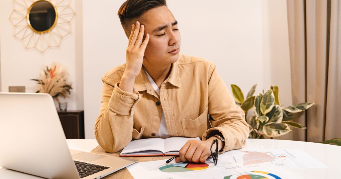 person overwhelmed by personal loan repayment consequences