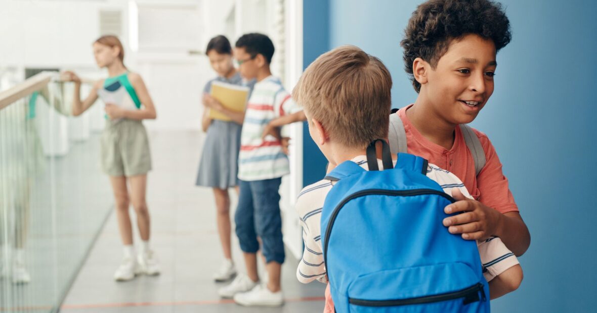 a backpack in an elementary school hallway representing the Brownsburg gun incident