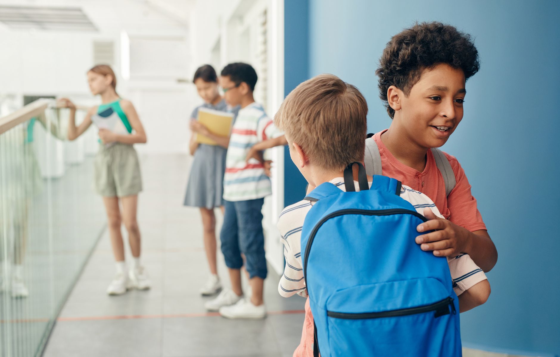 a backpack in an elementary school hallway representing the Brownsburg gun incident