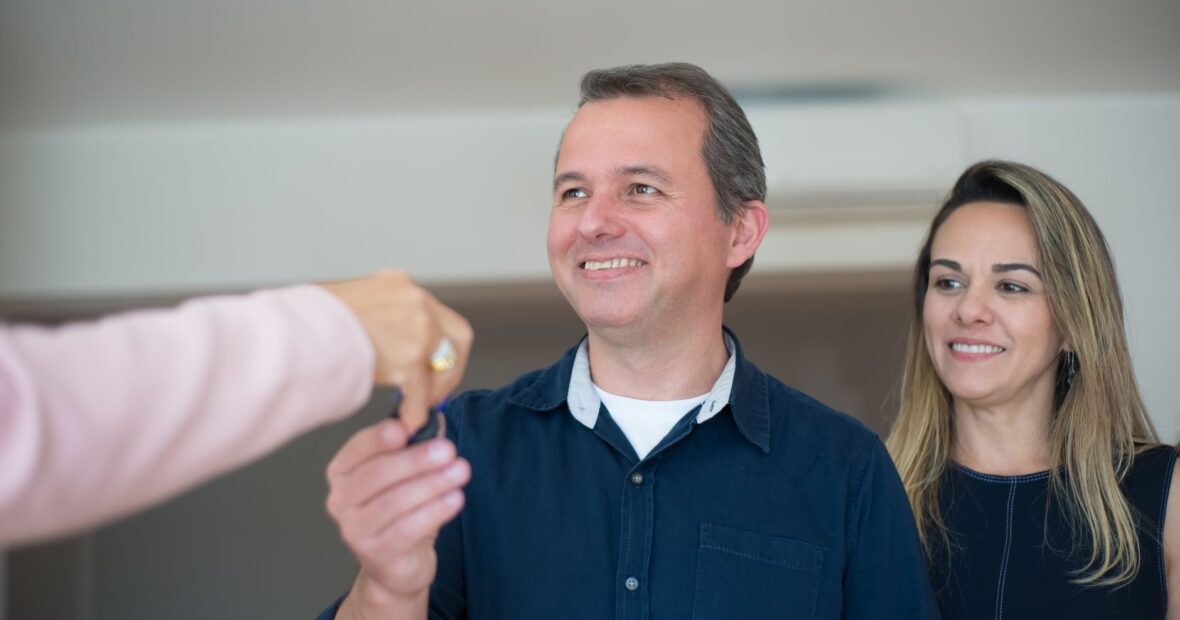 homeowner reviewing stimulus check update for $1,400 state rebate program