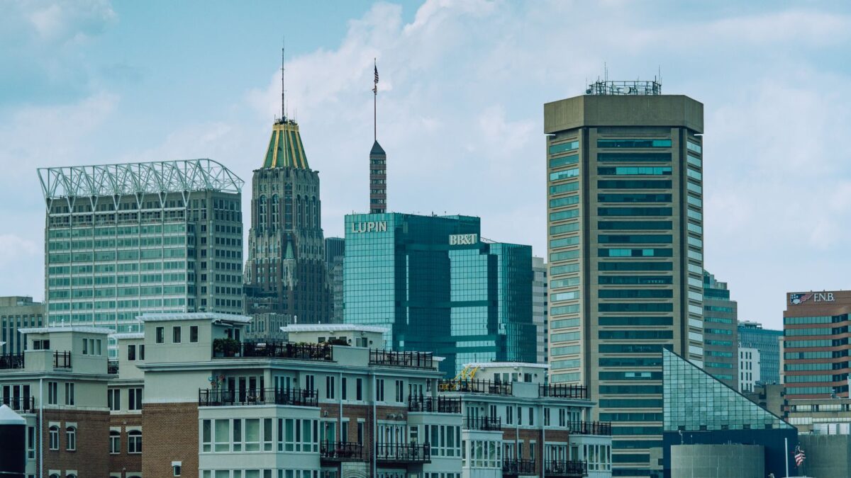 Baltimore Inner Harbor skyline with downtown towers, featured image for the 2026 neighborhoods guide