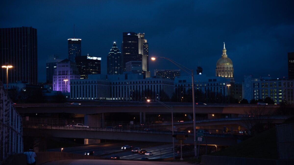 Illuminated Atlanta skyline with downtown high-rise buildings at night
