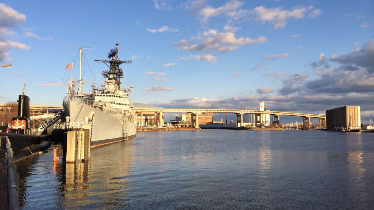 Buffalo waterfront skyline with the USS Little Rock docked on a sunny day