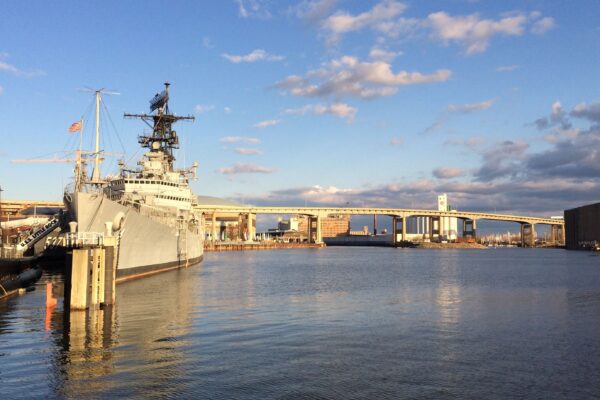 Buffalo waterfront skyline with the USS Little Rock docked on a sunny day