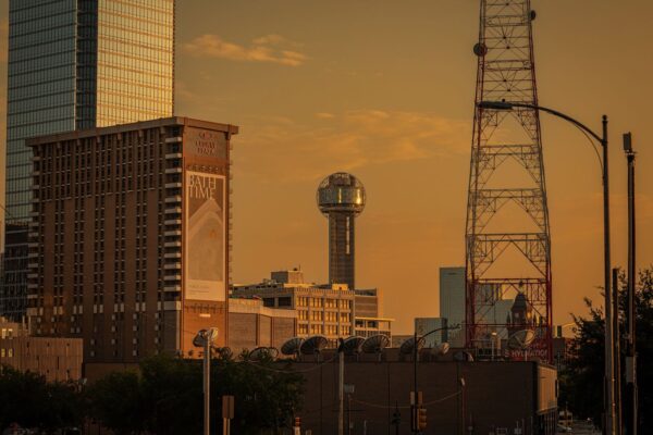 Dallas skyline at sunset featuring Reunion Tower