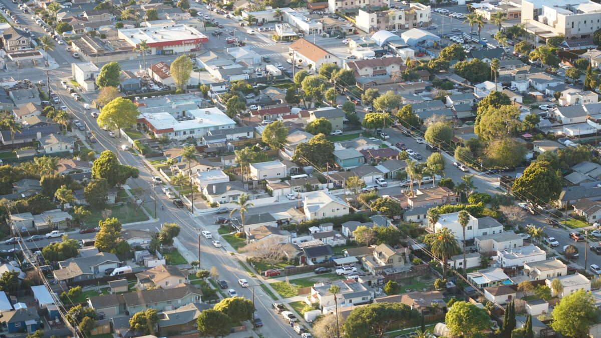 Palm trees and tidy suburban homes in a quiet California neighborhood