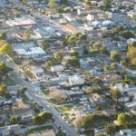 Palm trees and tidy suburban homes in a quiet California neighborhood