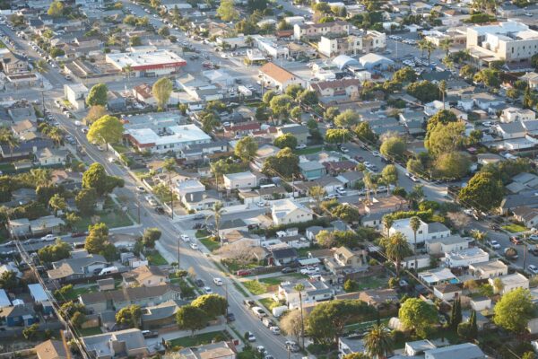 Palm trees and tidy suburban homes in a quiet California neighborhood
