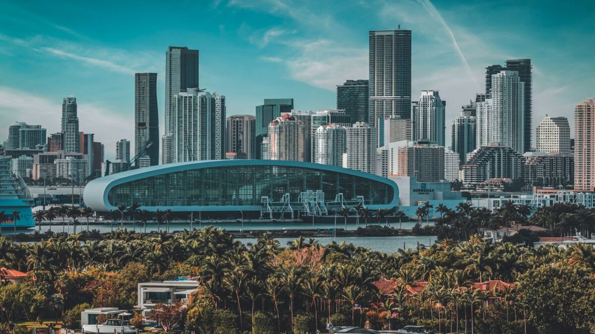 Miami skyline with modern skyscrapers and waterfront palm trees