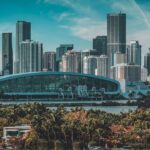 Miami skyline with modern skyscrapers and waterfront palm trees