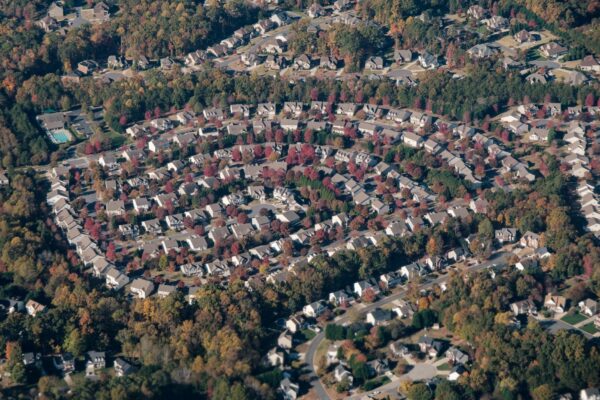 Suburban North Carolina neighborhood street with well-kept homes
