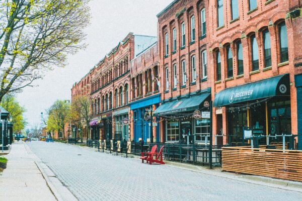 Charming small-town main street with brick buildings and cafes in New York state