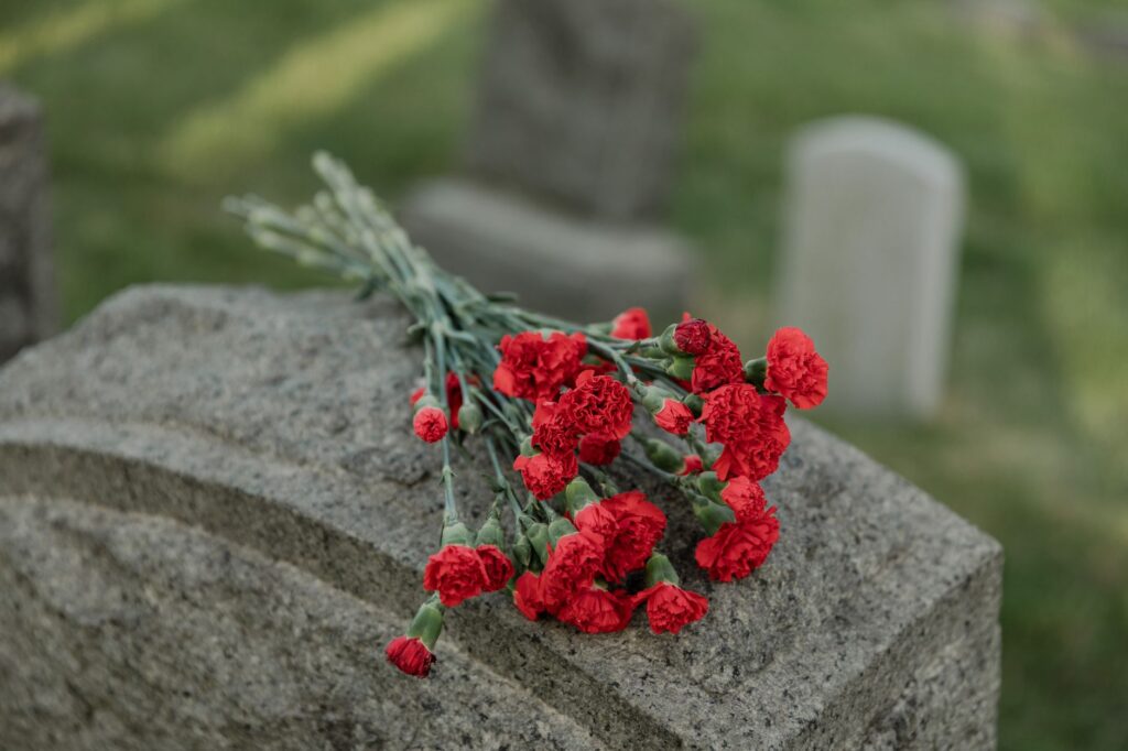 memorial flowers outside Plains Georgia home honoring Rosalynn Carter